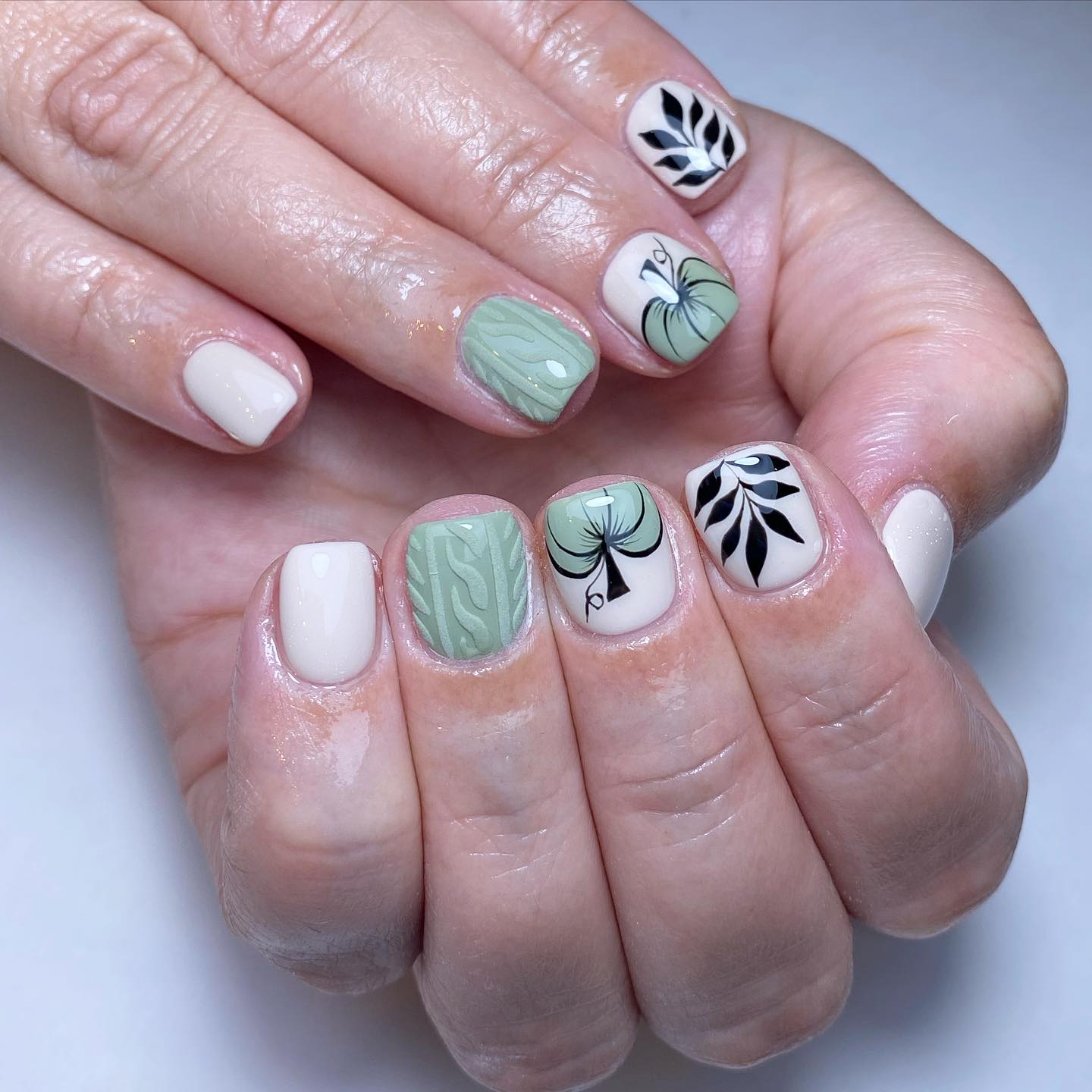 Artistic Green and Black Nail Art