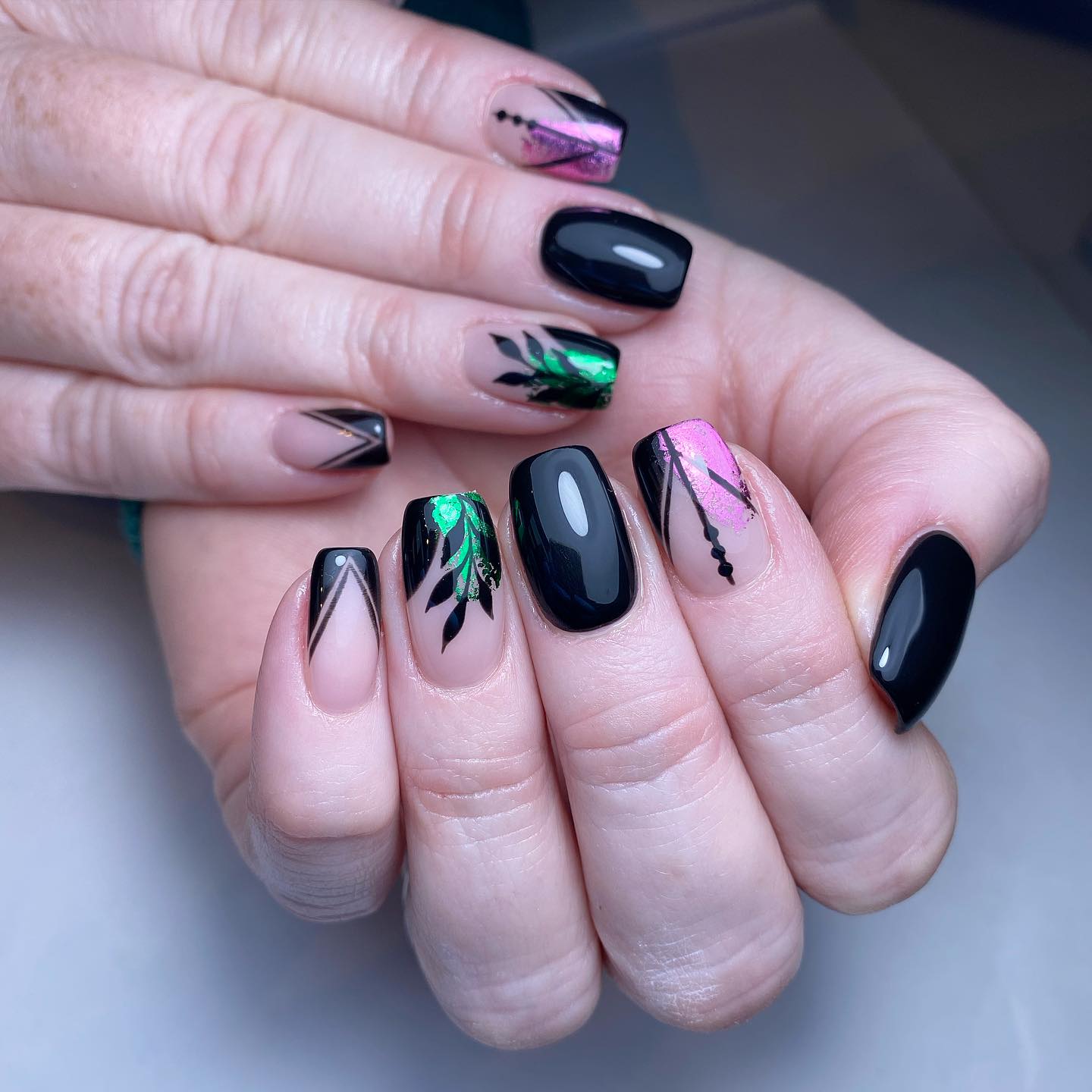 Artistic Black and Green Nails