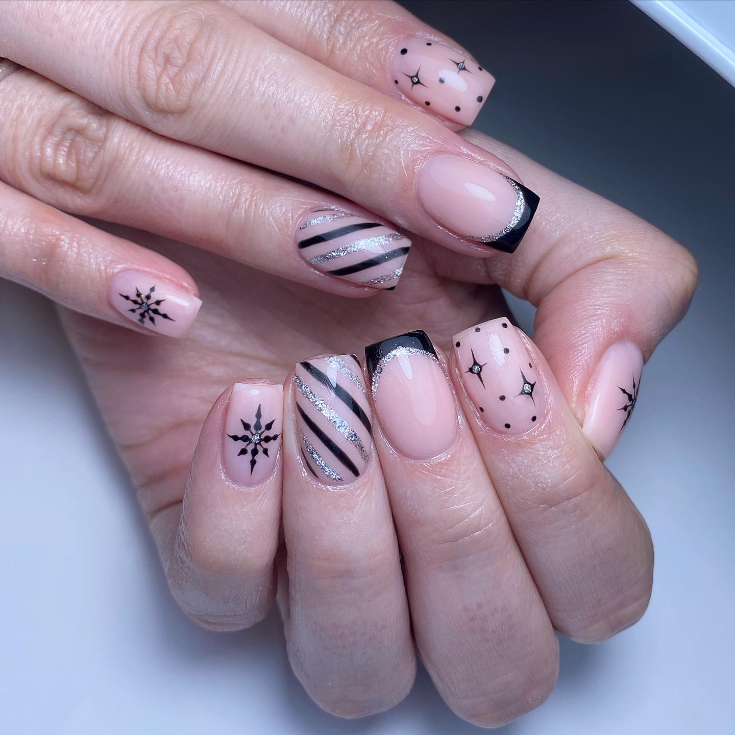 Elegant Black and Nude Nail Art