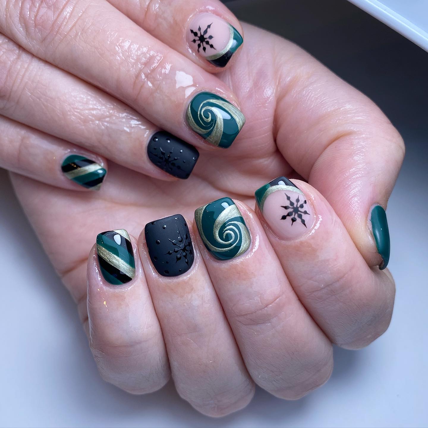 Artistic Green and Black Nails