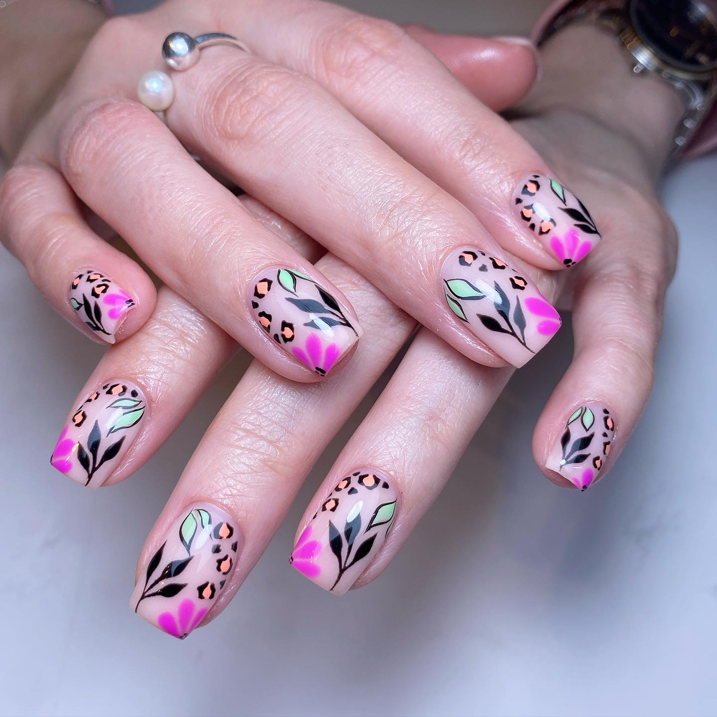 Elegant Floral and Animal Print Nails