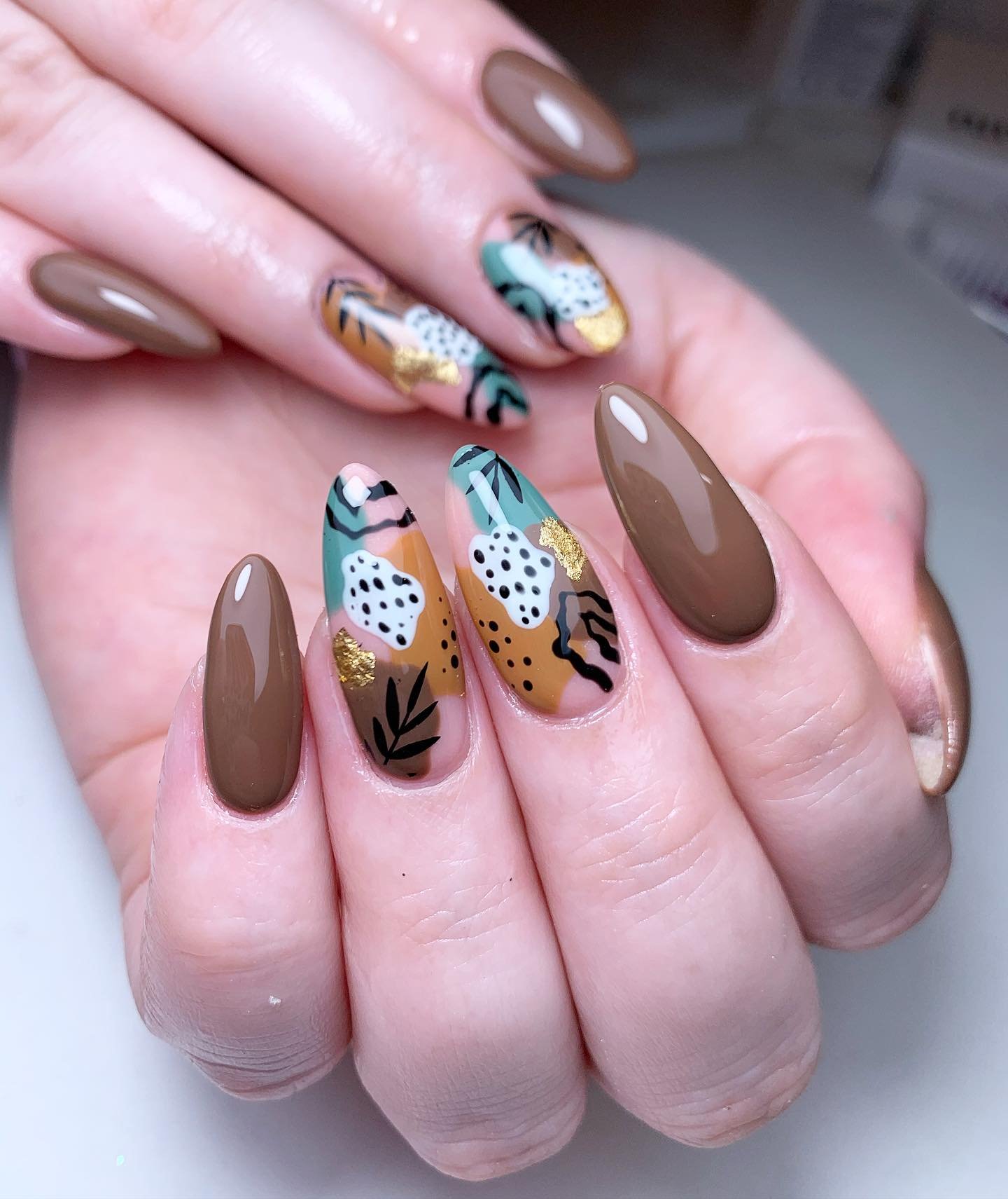Artistic Brown and Colorful Nails