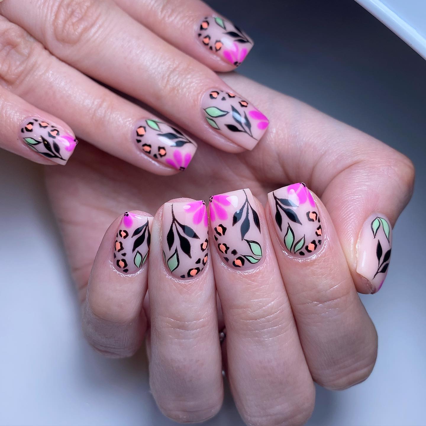 Artistic Floral and Animal Print Nails