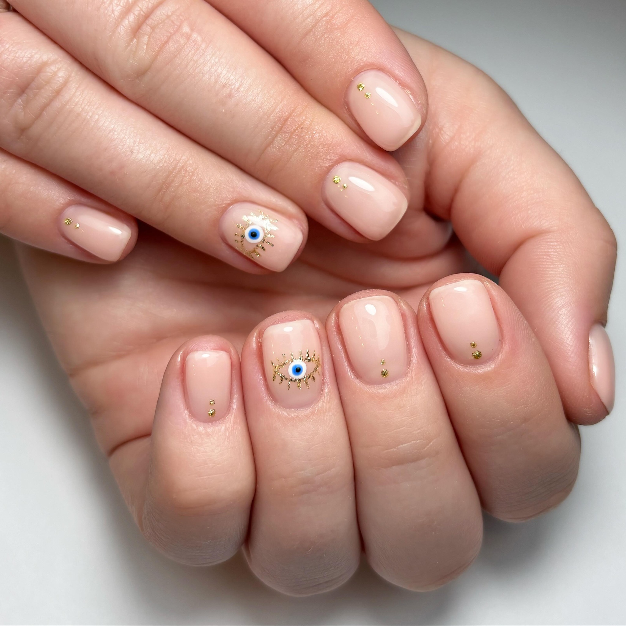 Nude Nails with Eye Designs