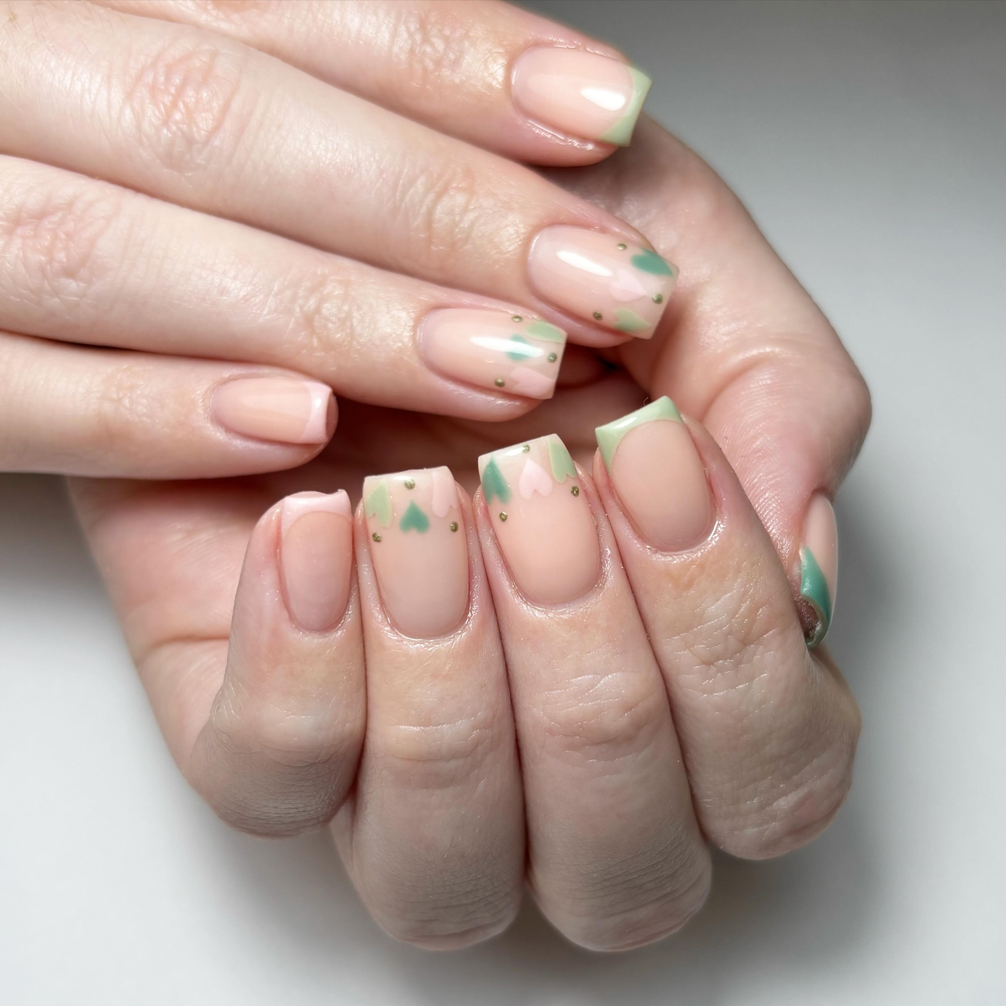 Nude and Green Patterned Nails