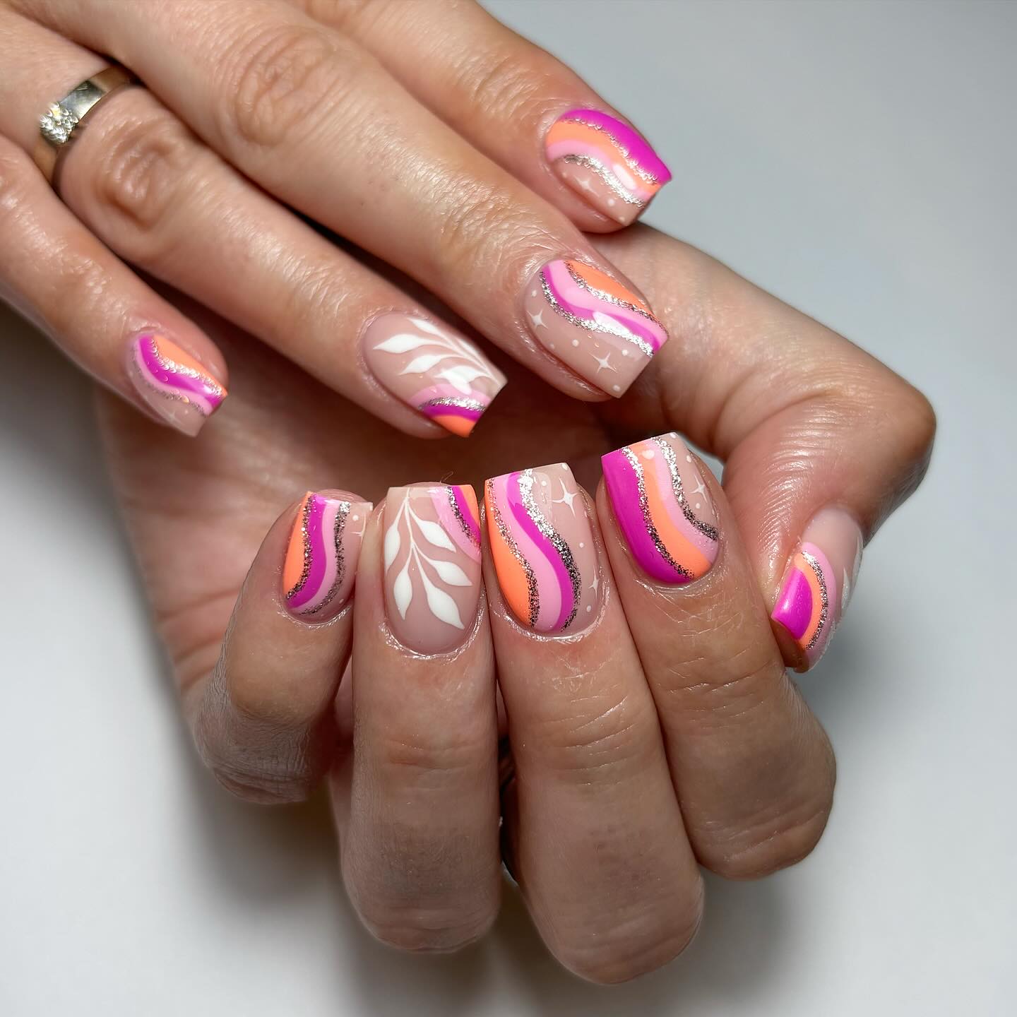 Artistic Pink and Neon Nail Design