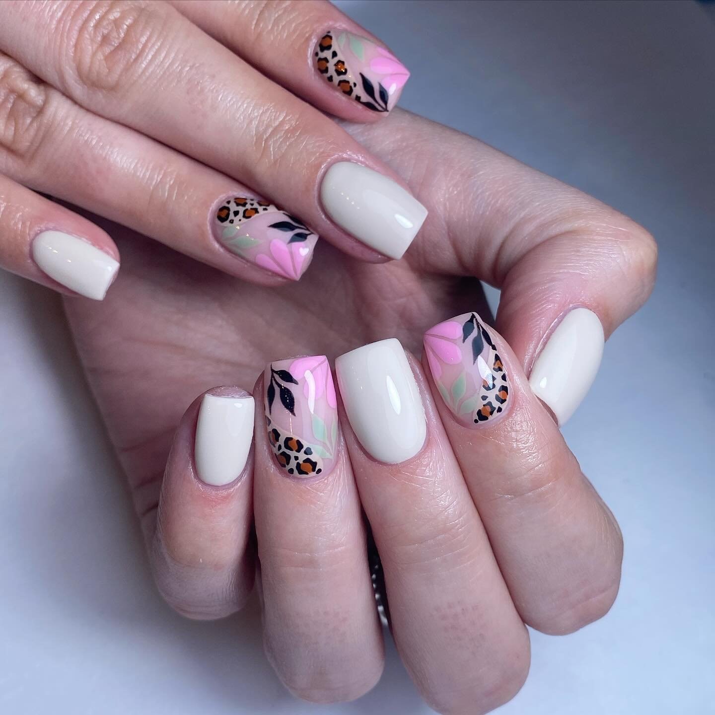 Artistic Floral and Animal Print Nails