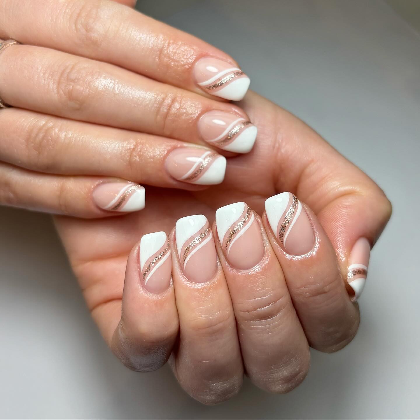 Elegant Nude and White Nails with Glitter