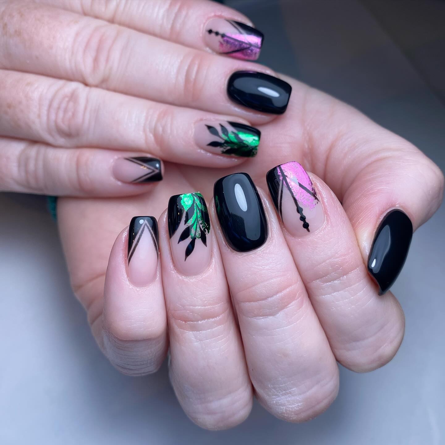 Artistic Black and Colorful Nail Design