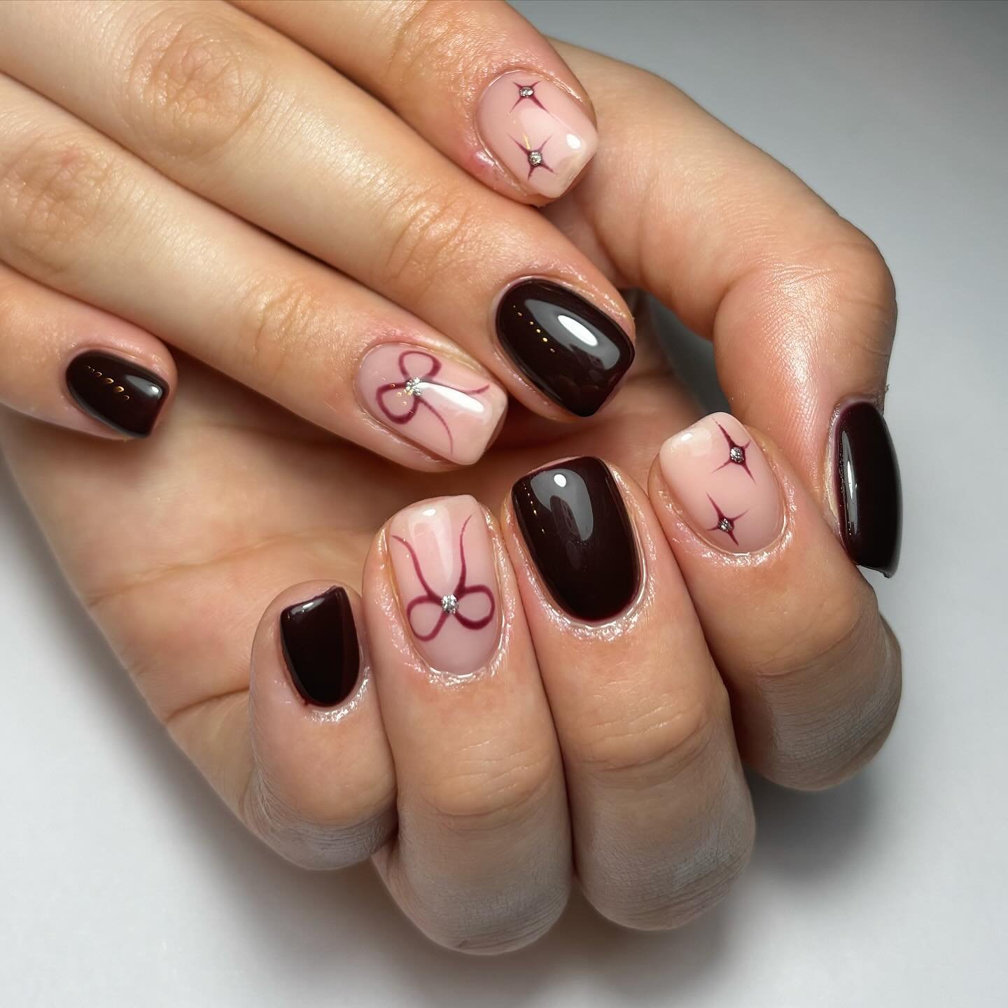 Elegant Dark and Nude Nail Art