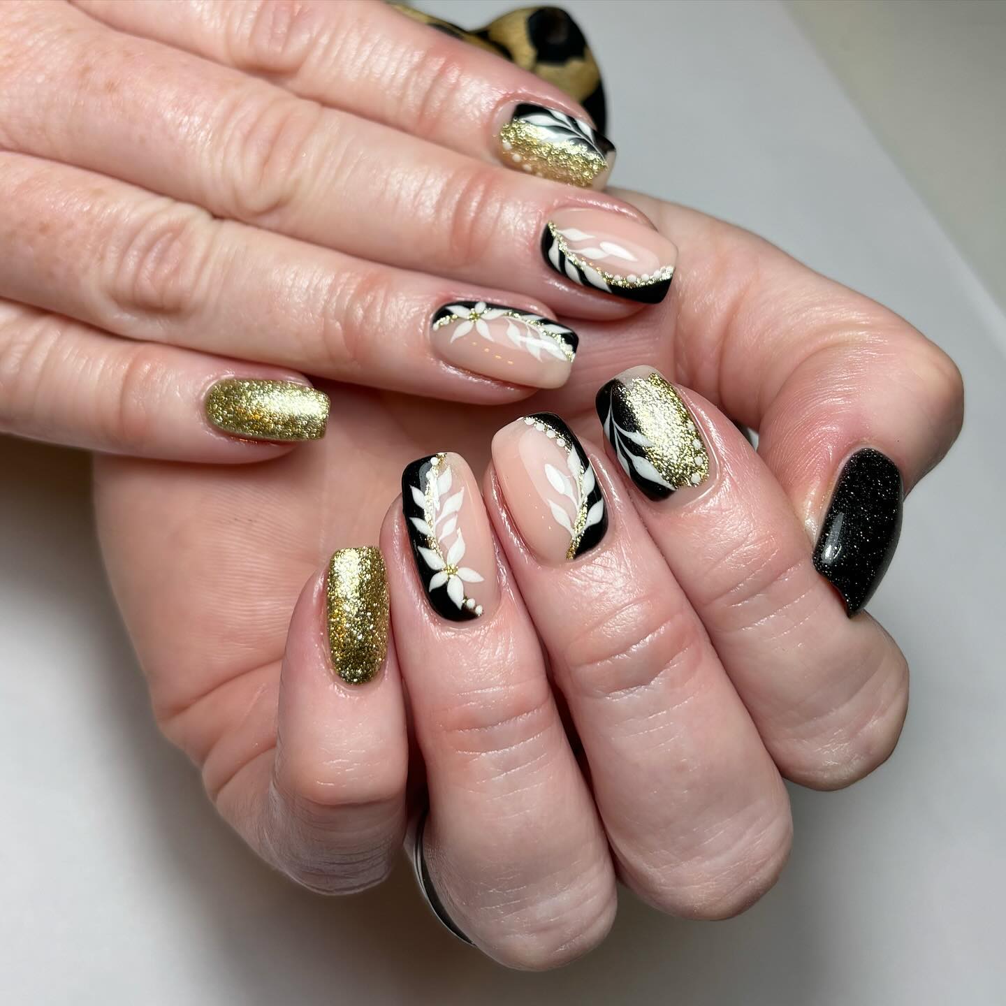 Elegant Gold and Black Nail Art