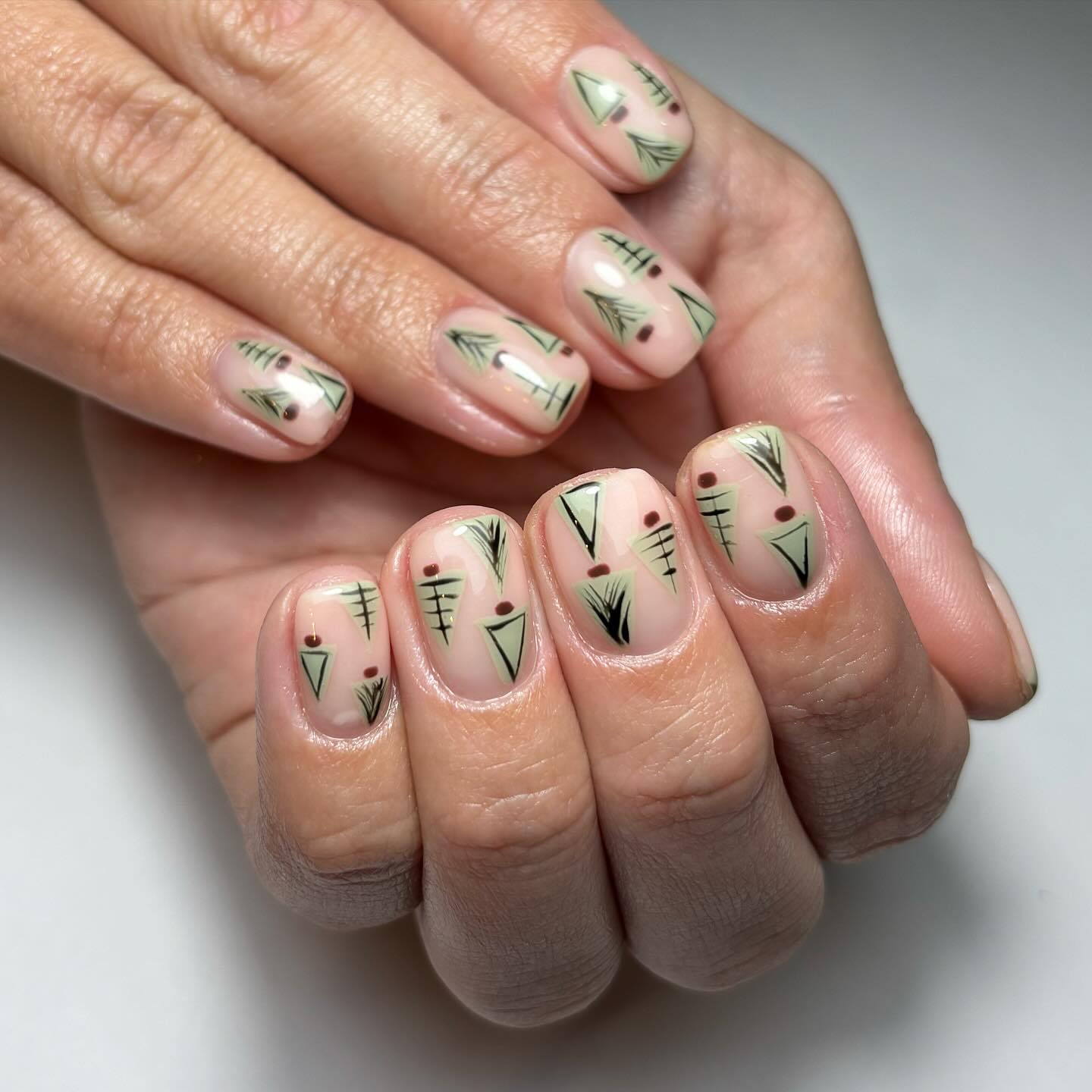 Artistic Green Patterned Nails