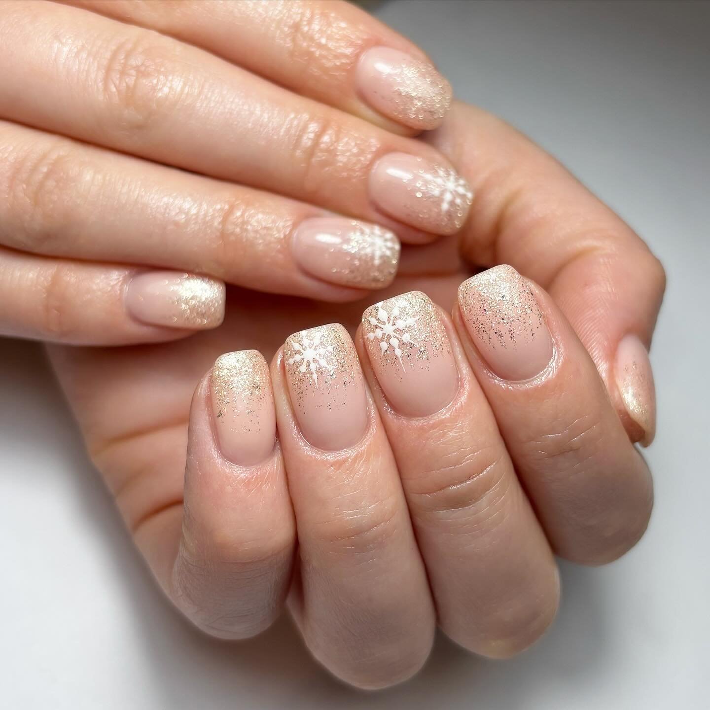 Elegant Nude and Gold Glitter Nails