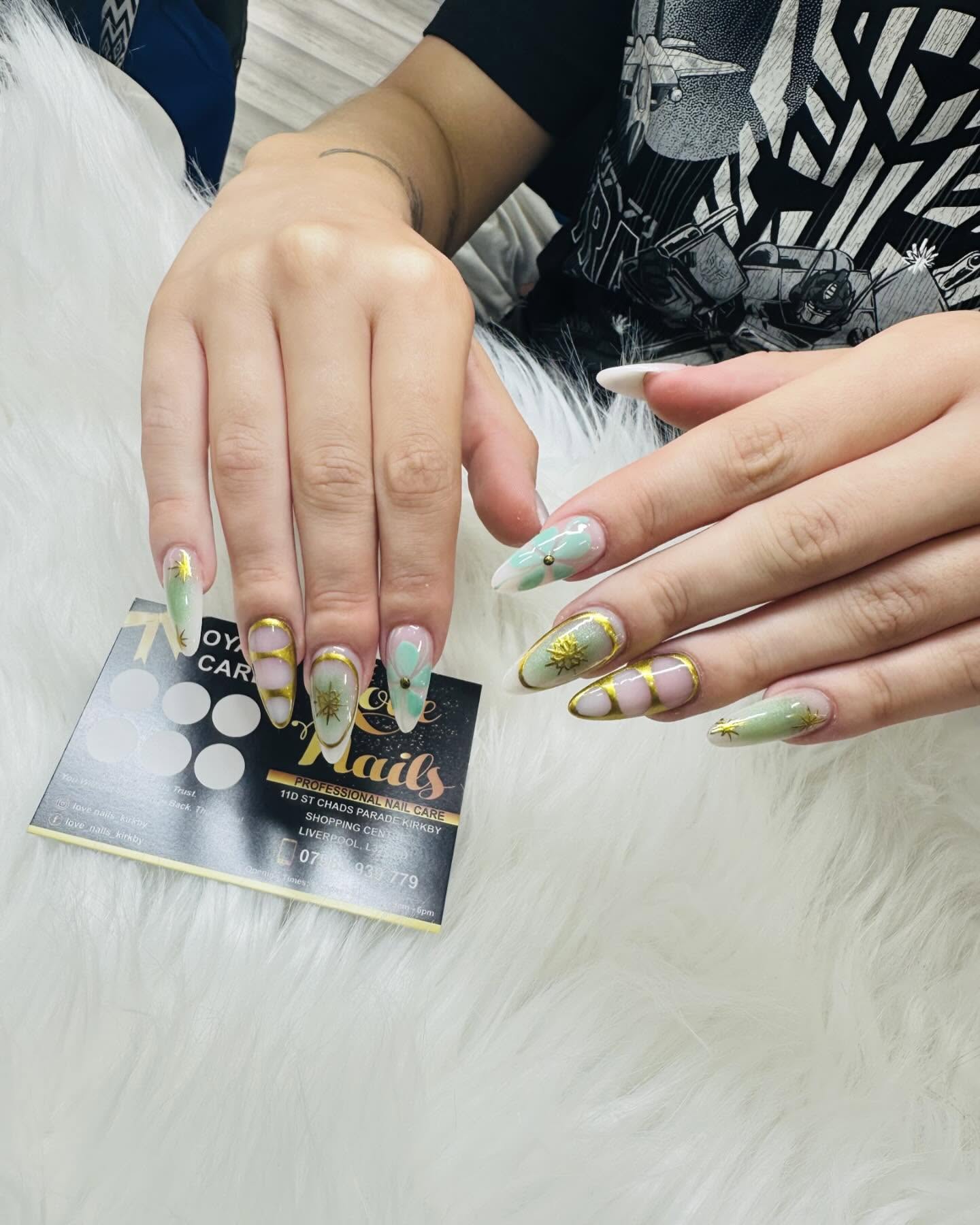 Artistic Green and Gold Nails