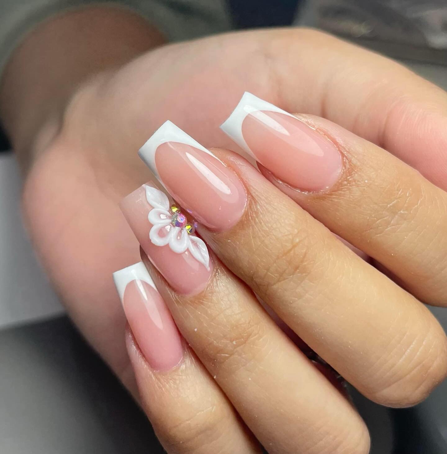 Elegant French Tip Nails with Flower Design