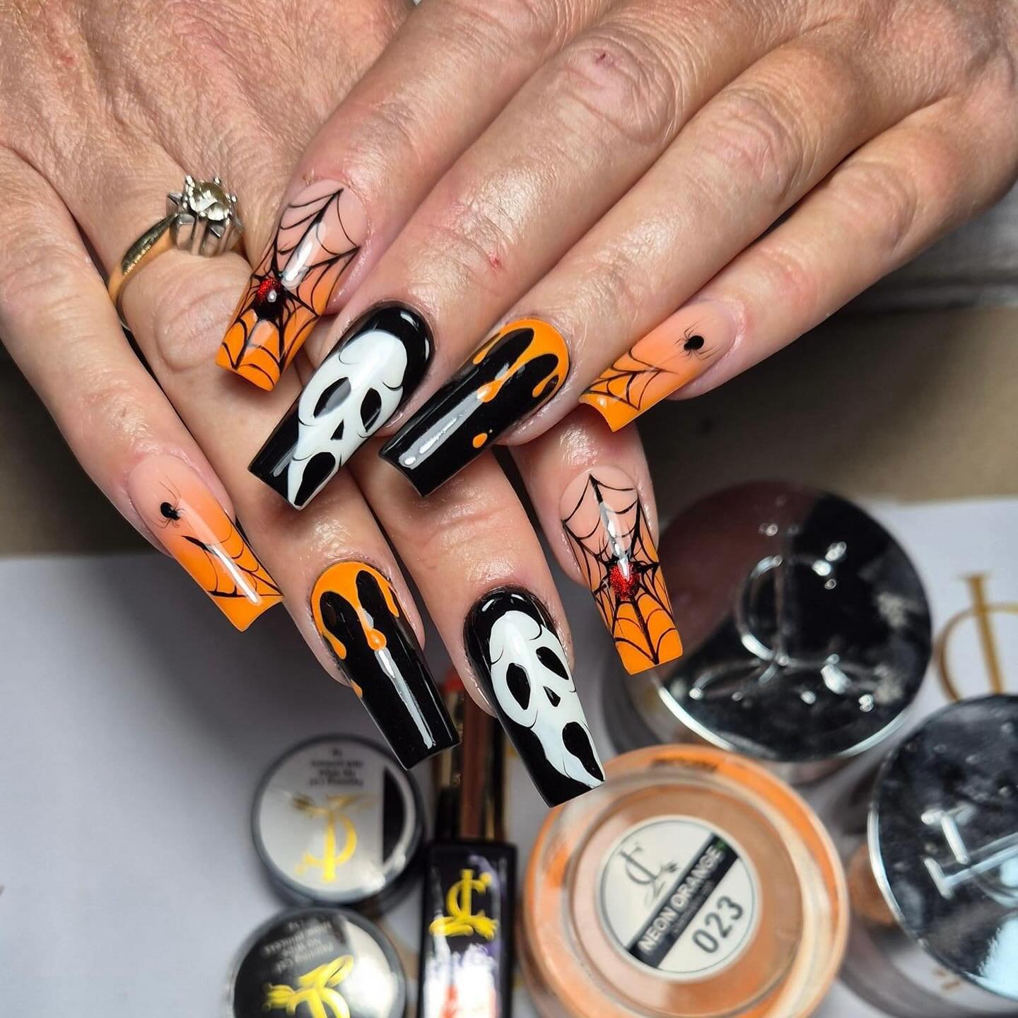 Halloween Themed Nails with Skulls and Spider Webs