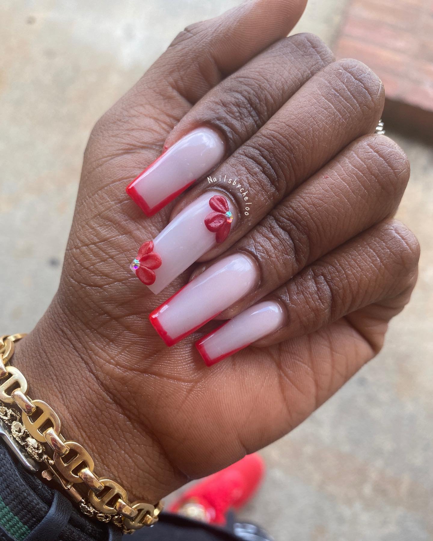 Nail Art with Red Tips and Flowers