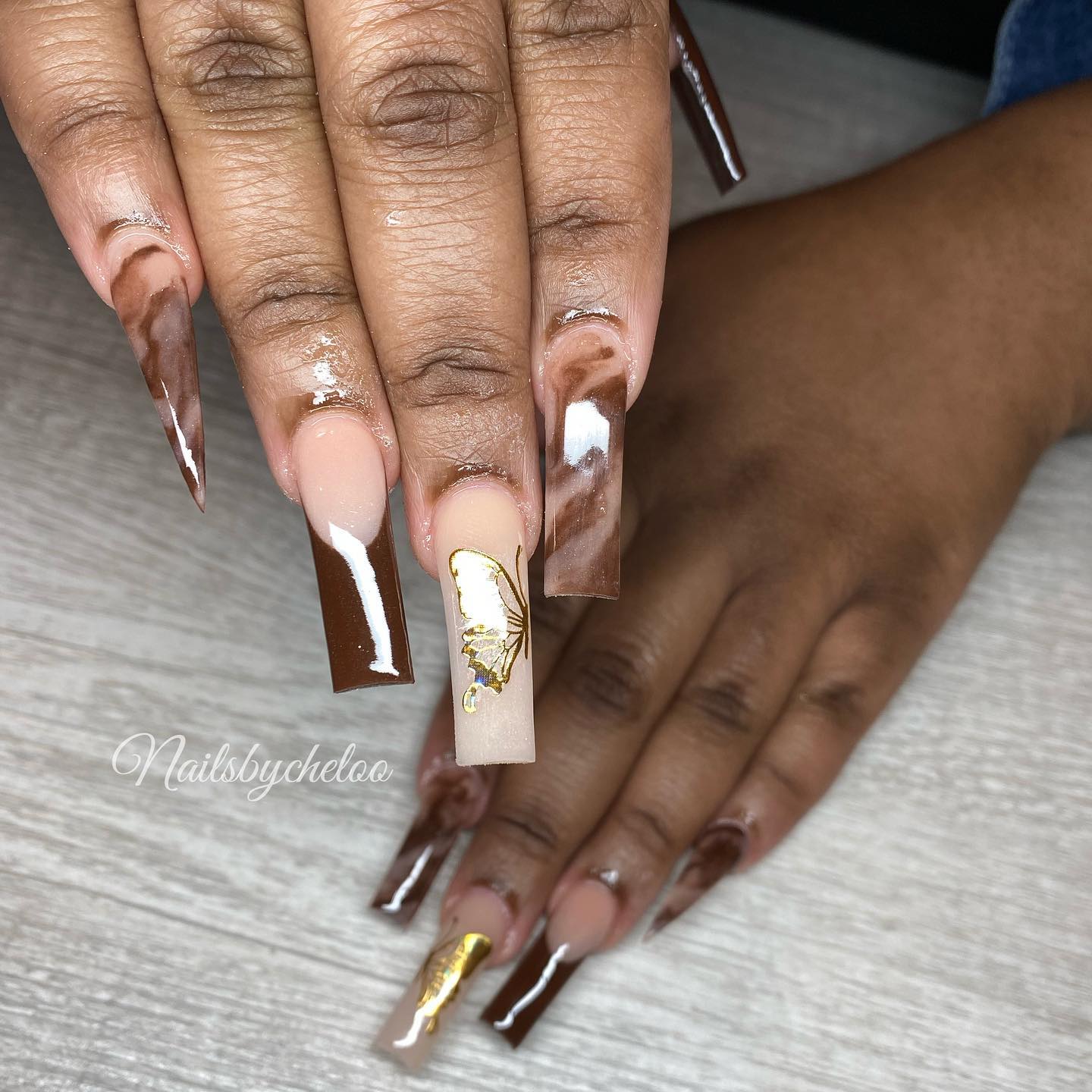 Elegant Brown and Nude Butterfly Nails