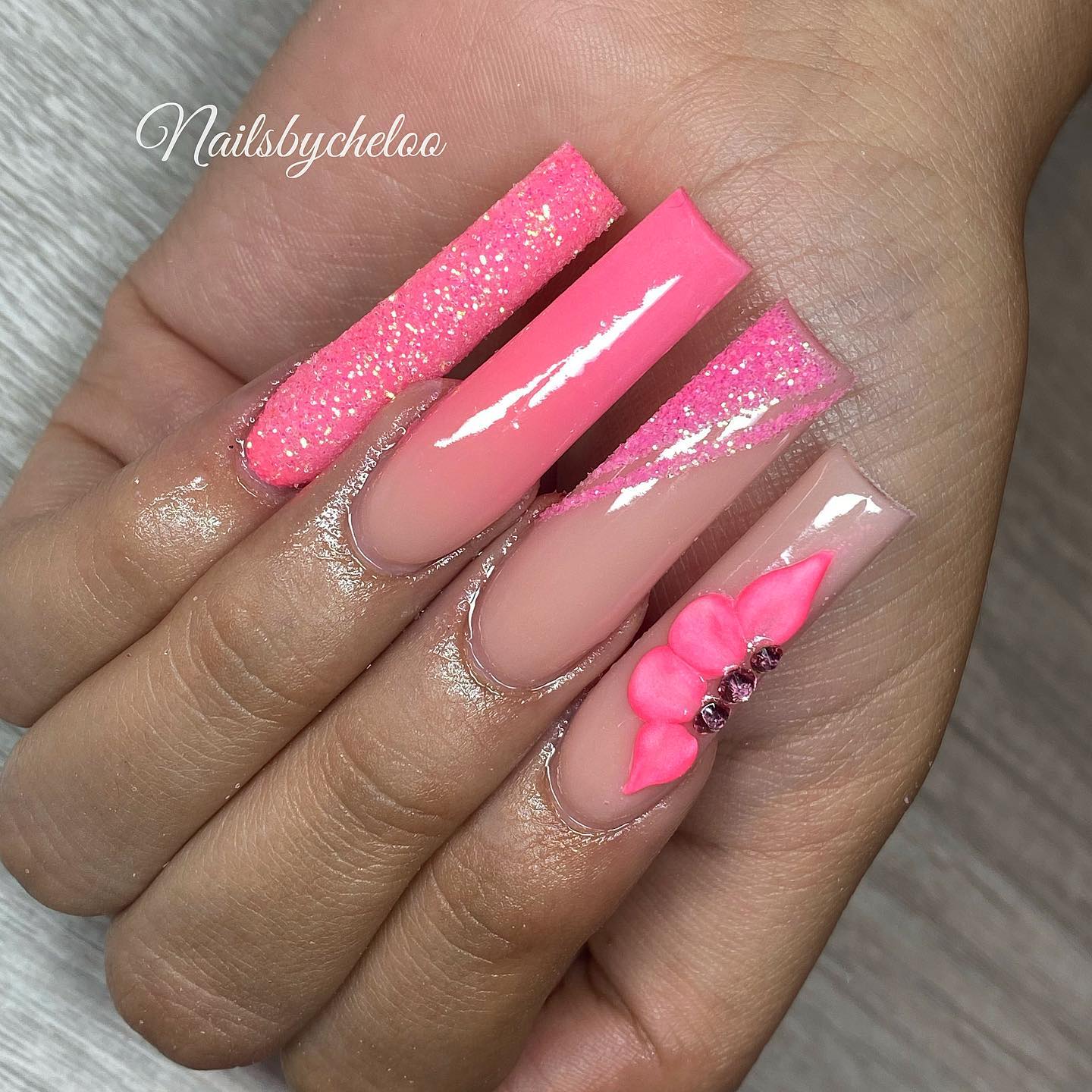 Stylish Pink Glitter Nails with Bows