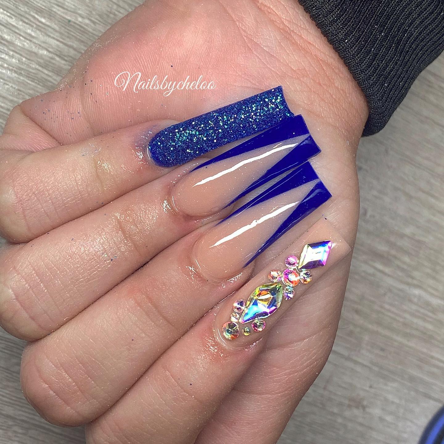 Stunning Blue and Glitter Nail Design