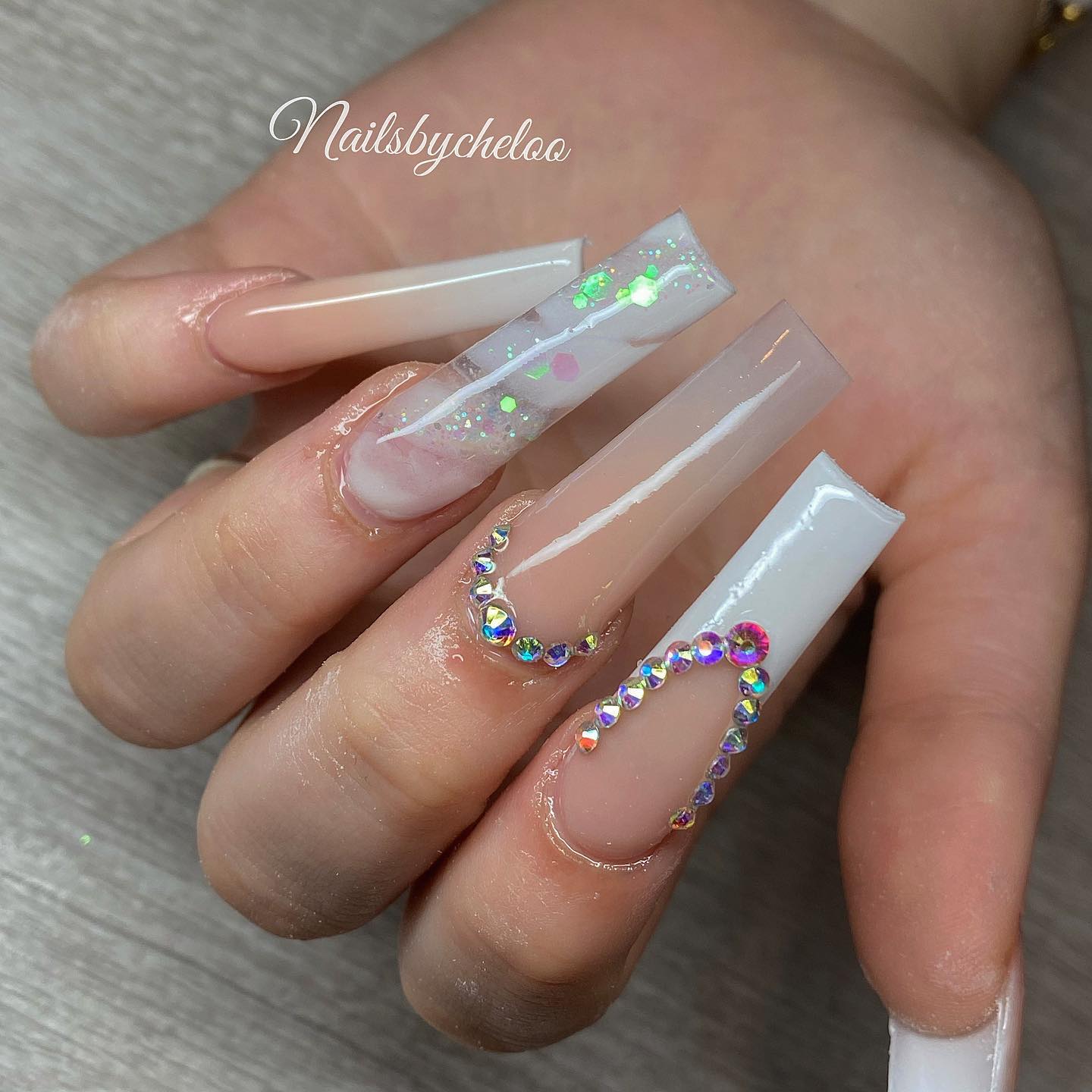 Elegant Nude and Glitter Nail Design