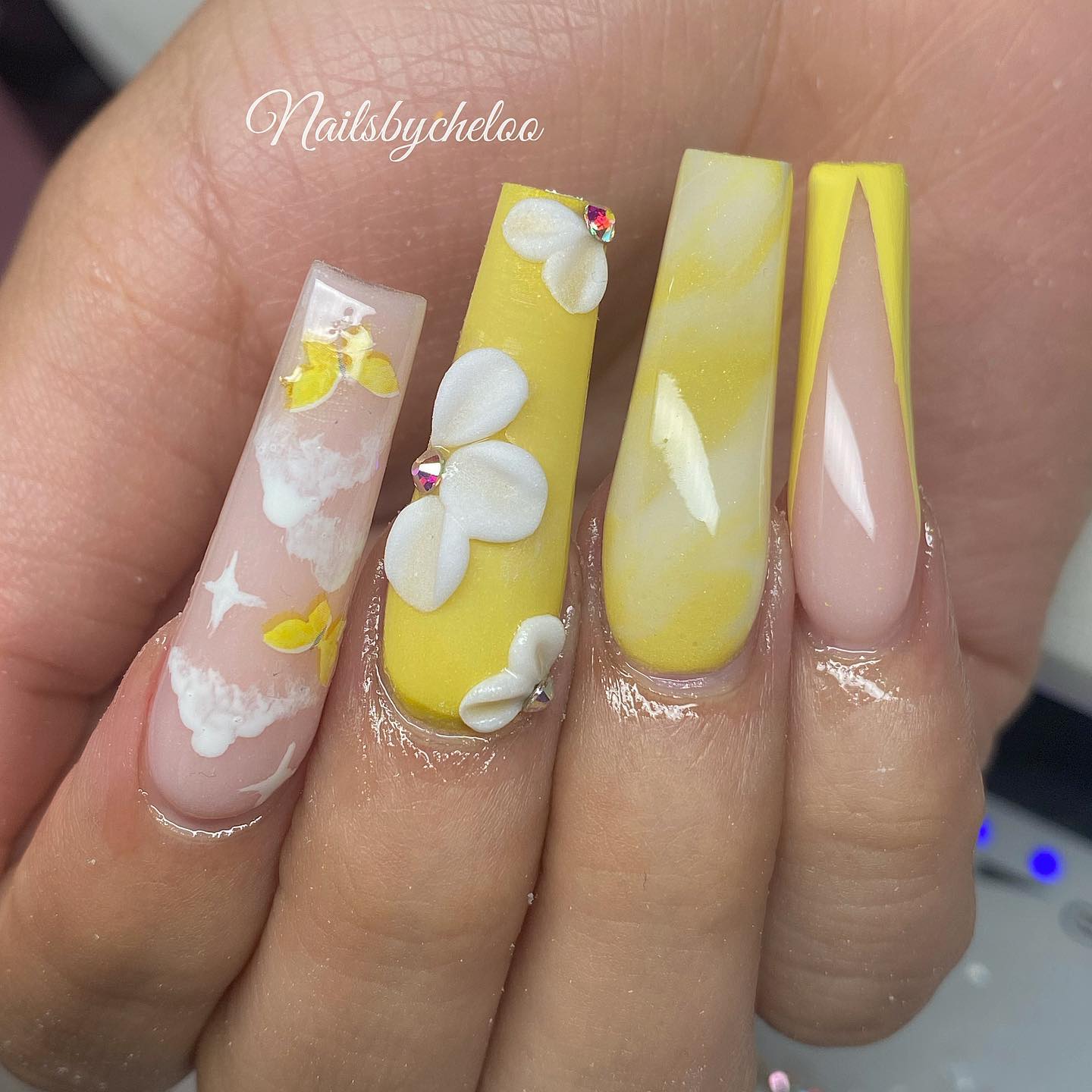 Nail Art with Yellow and Floral Designs