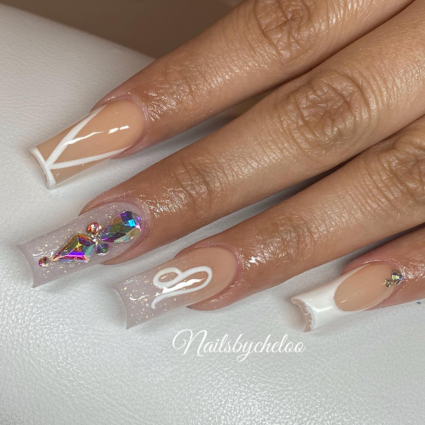 Elegant Nude Nails with Gems