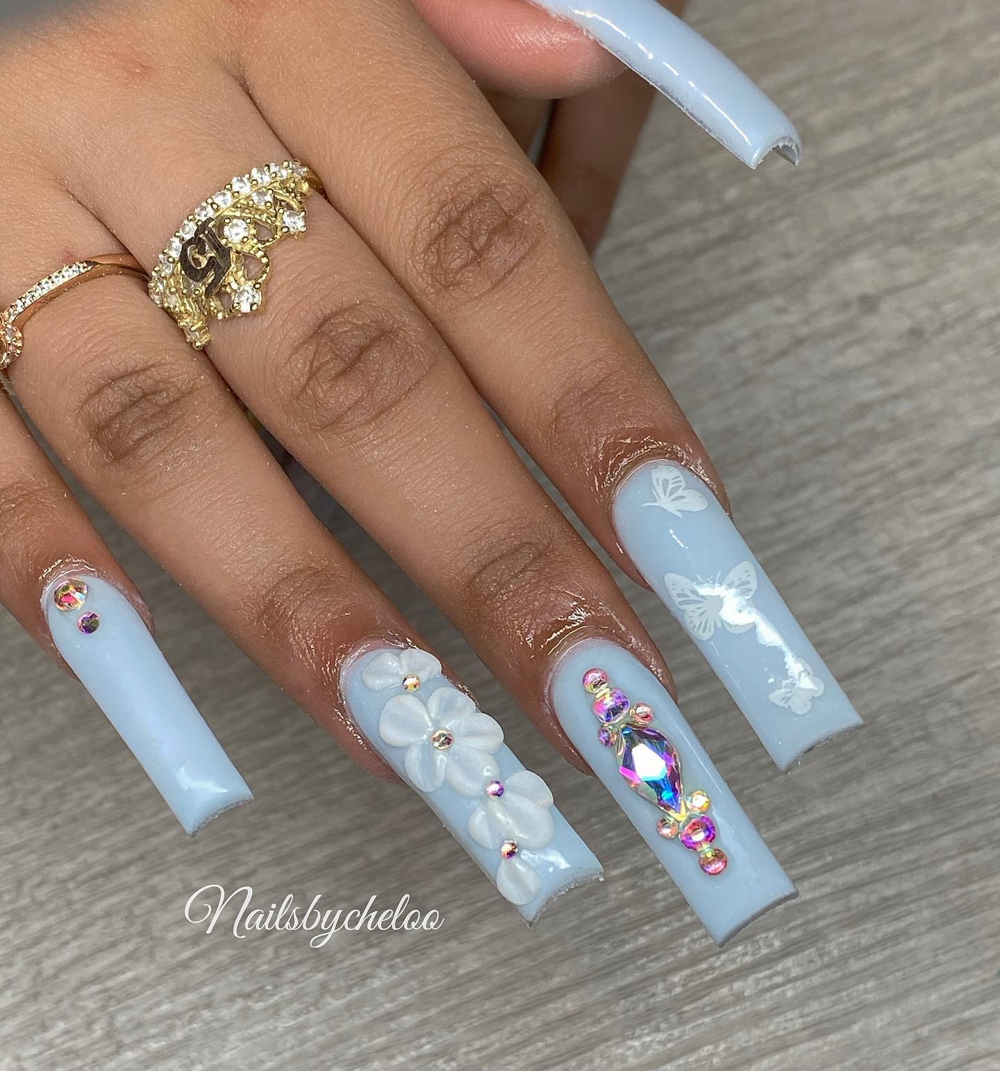 Elegant Blue and White Floral Acrylic Nails