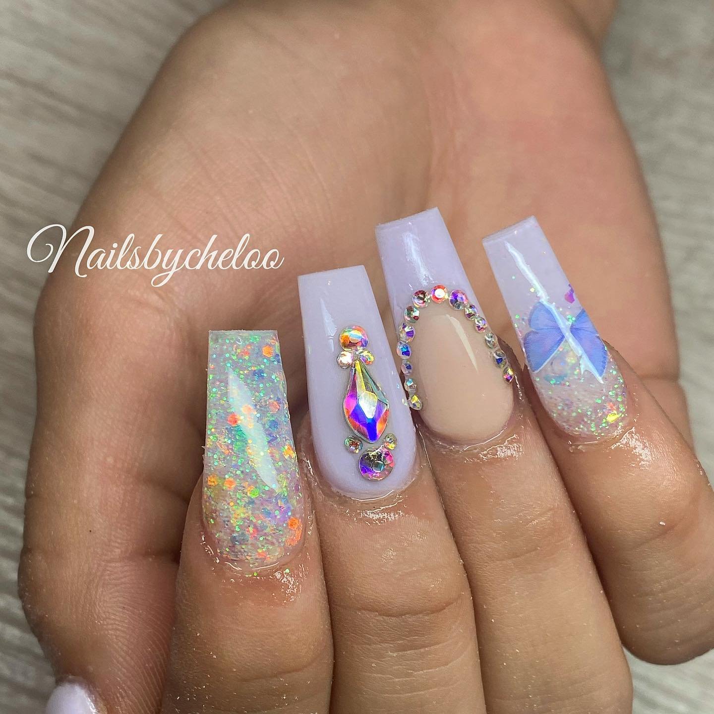 Artistic Glittery Nails with Rhinestones
