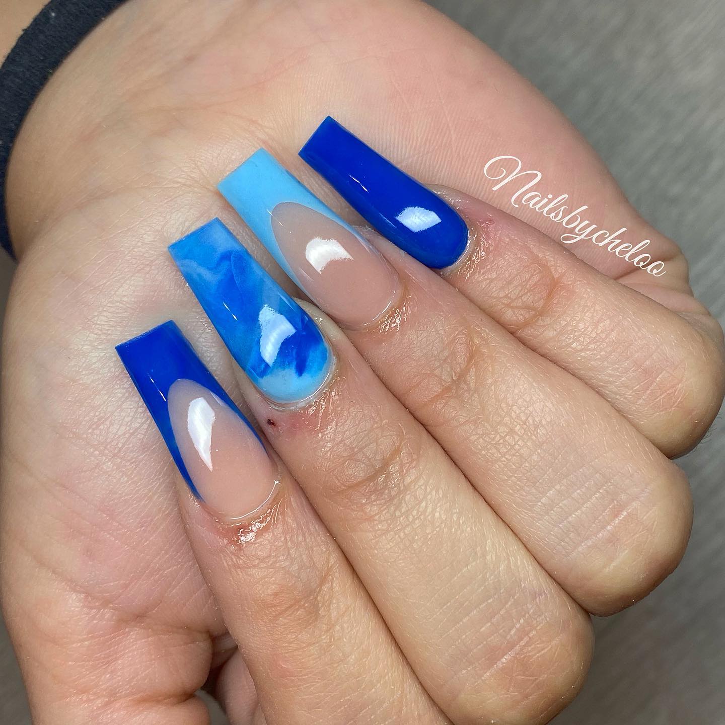Artistic Blue Nails with Ombre Effect