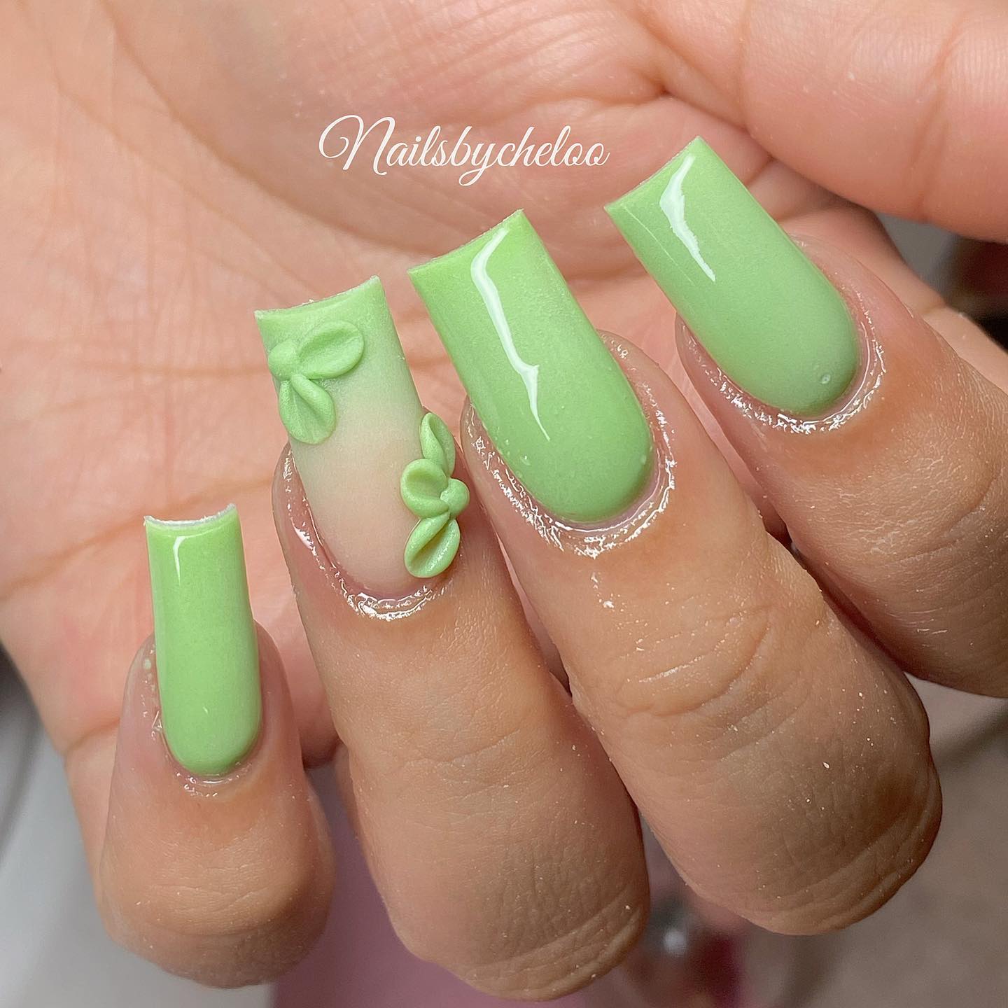 Elegant Green Nails with Floral Accents