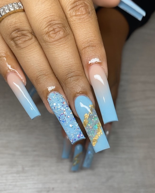 Elegant Blue and Glitter Nail Art