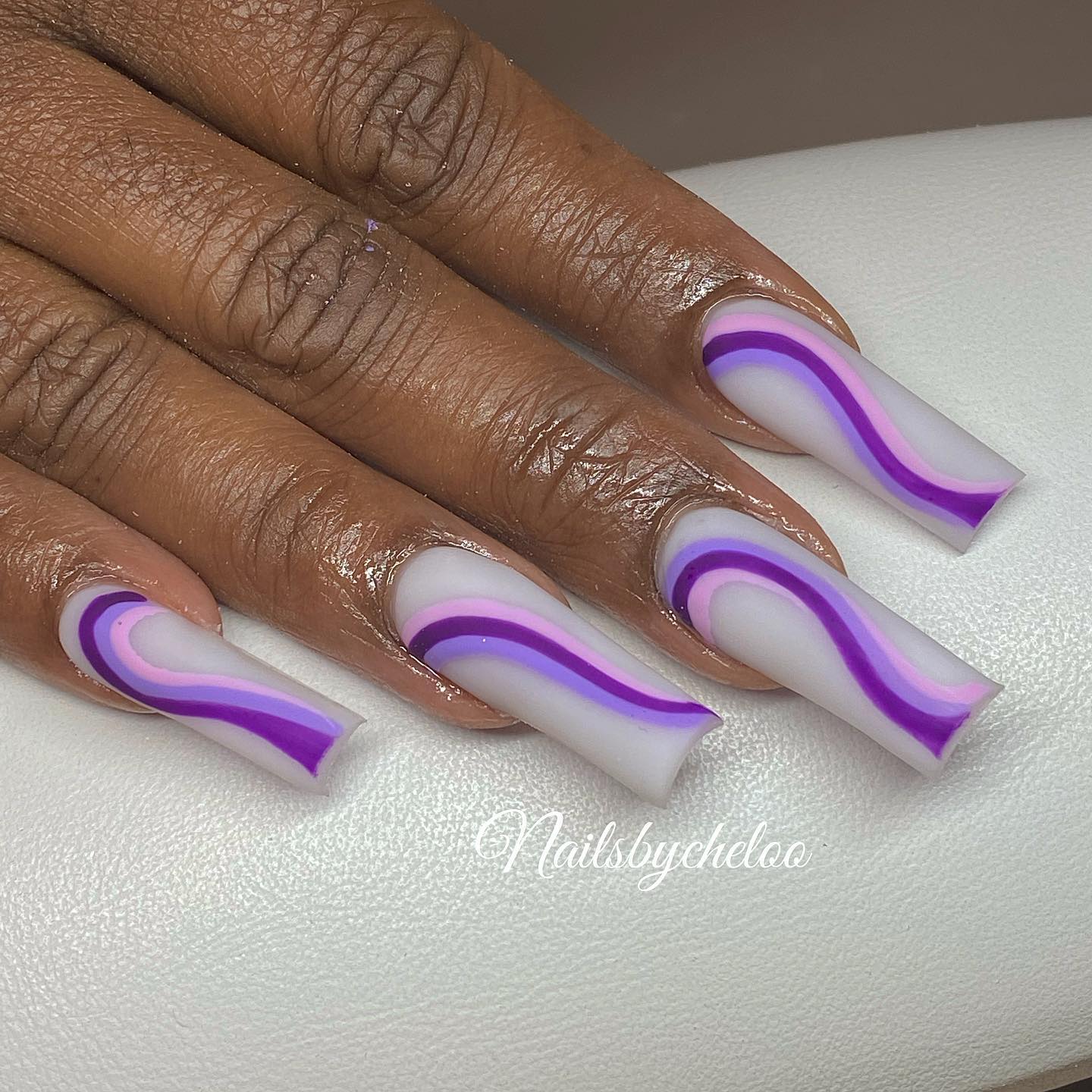 Elegant Purple and White Nail Design