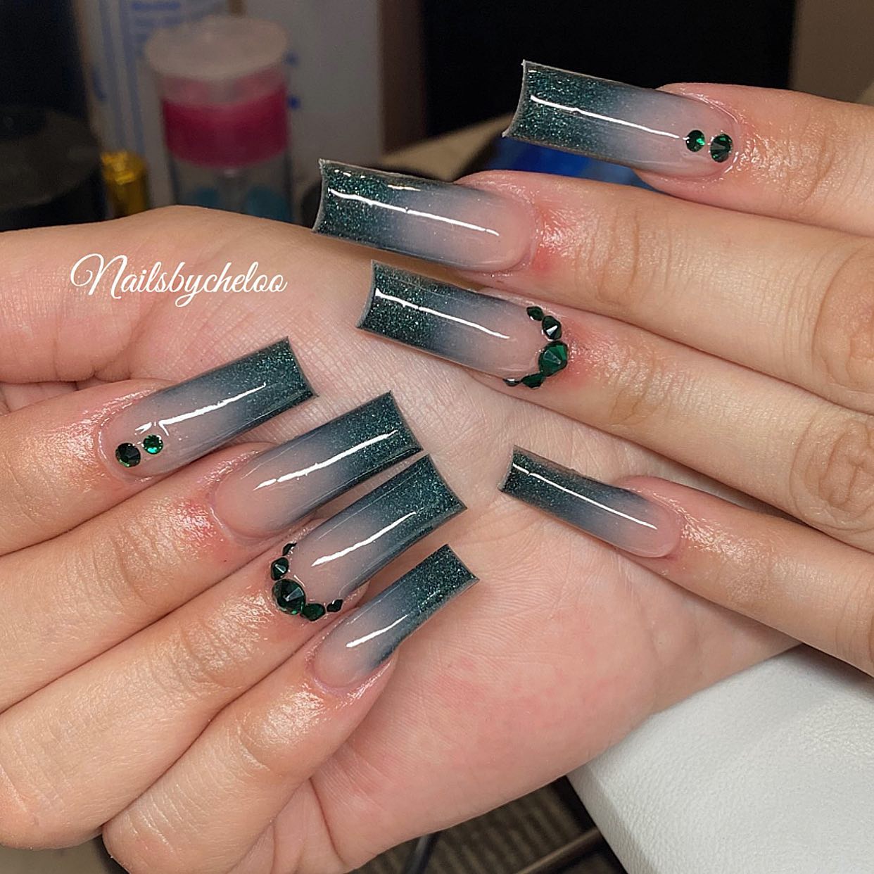 Elegant Green Ombre Nails with Gems
