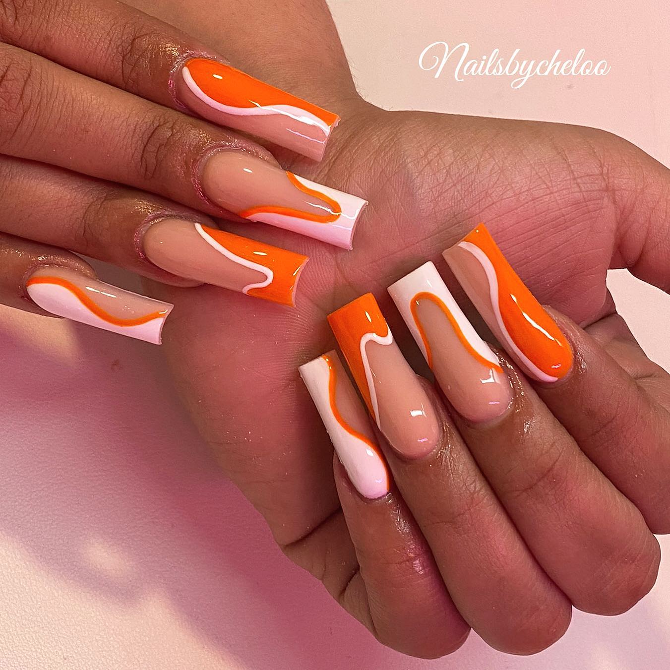Artistic Orange and White Nails