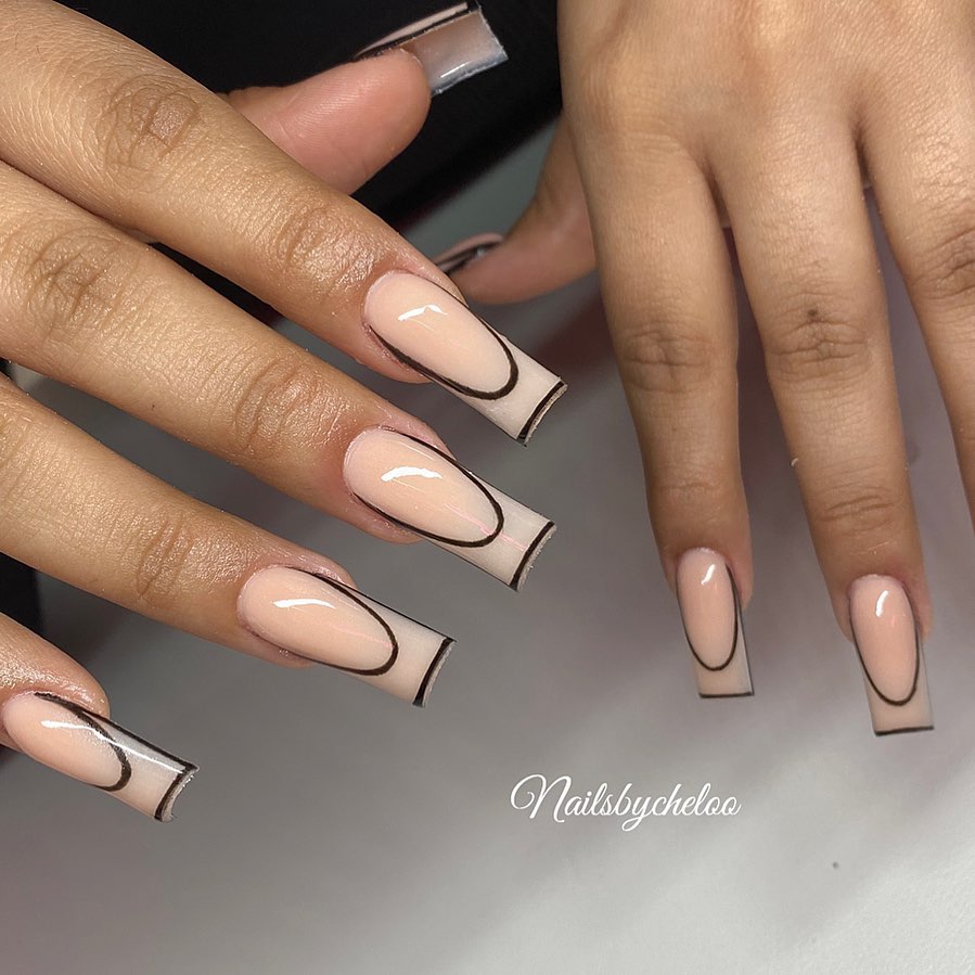 Artistic Nude and Black Nail Design