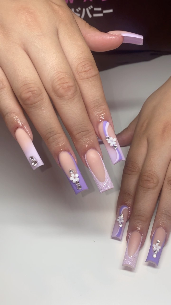 Elegant Purple and Nude Nails with Floral Accents