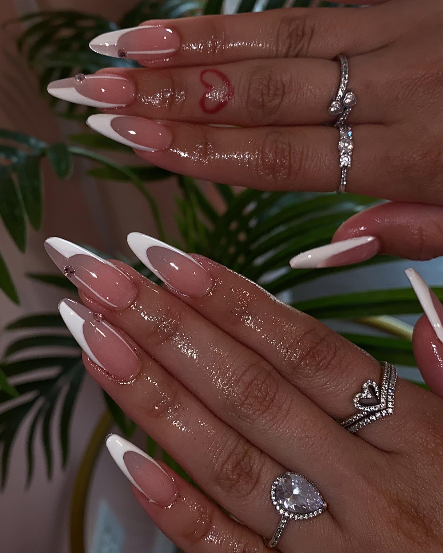 Elegant French Tip Nails with Gems