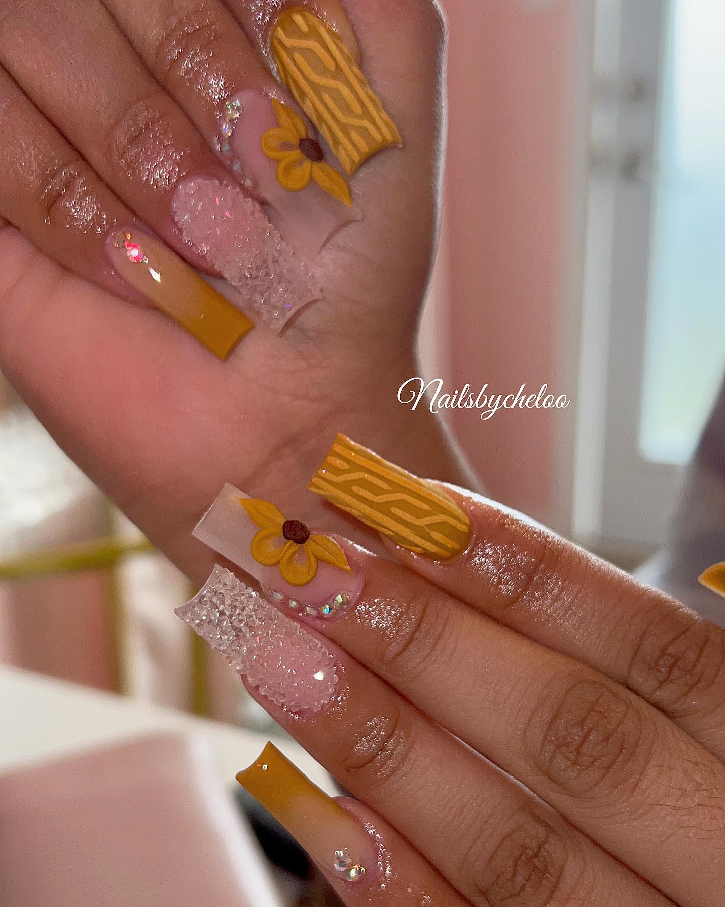Artistic Yellow and Pink Nail Design