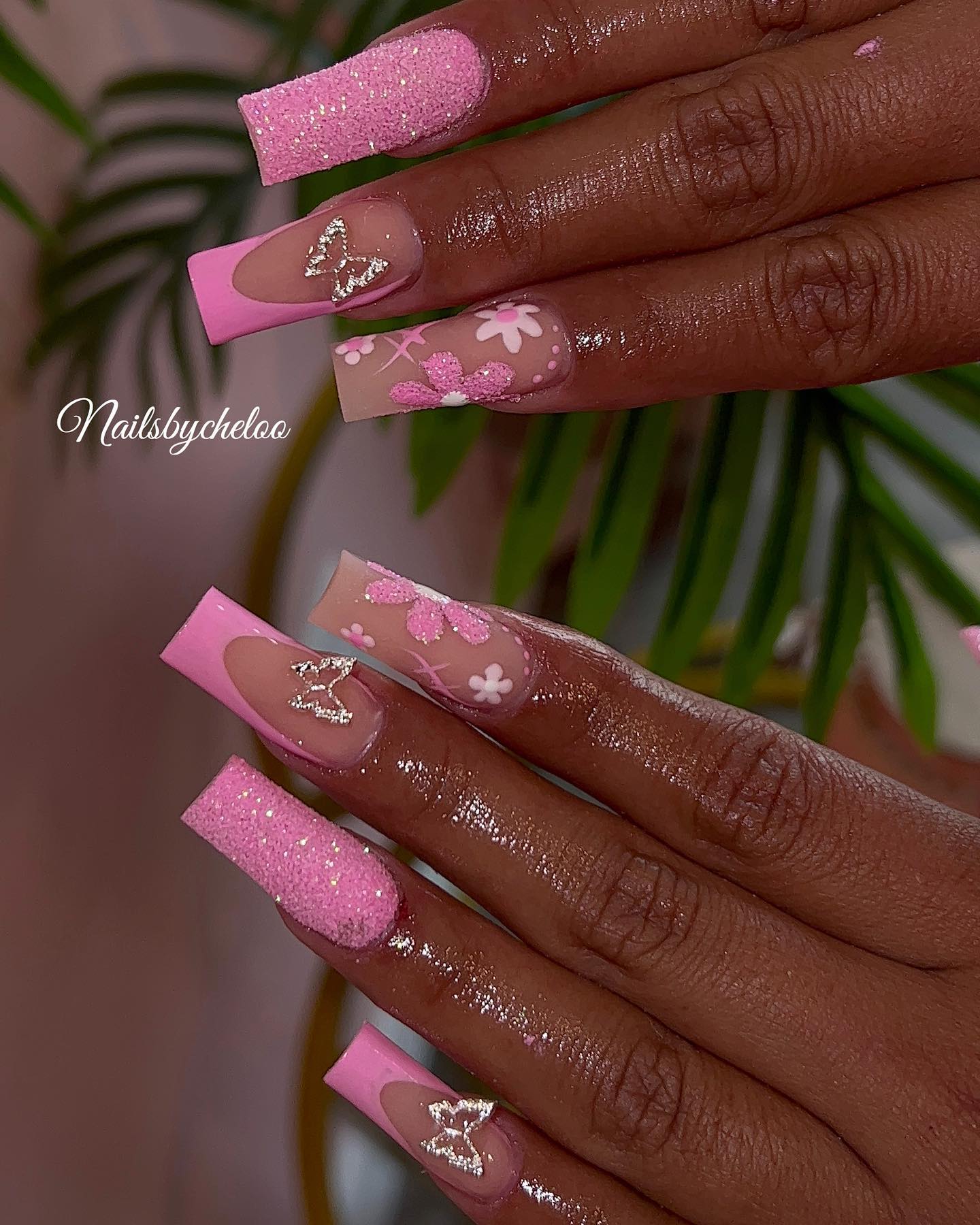 Trendy Pink Glitter and Floral Nails