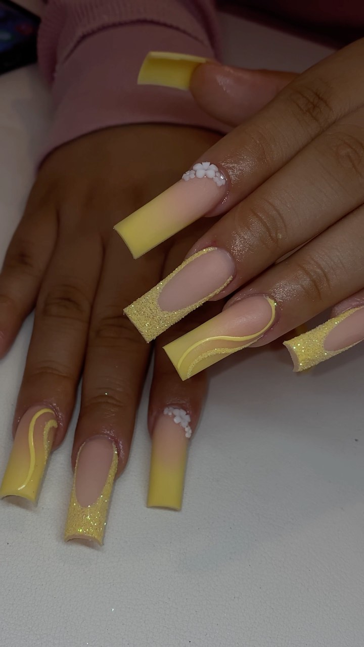 Stylish Yellow Nails with Glitter and Design