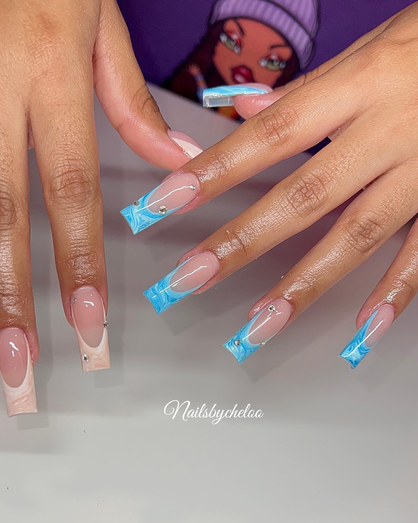 Artistic Blue and Nude Nails