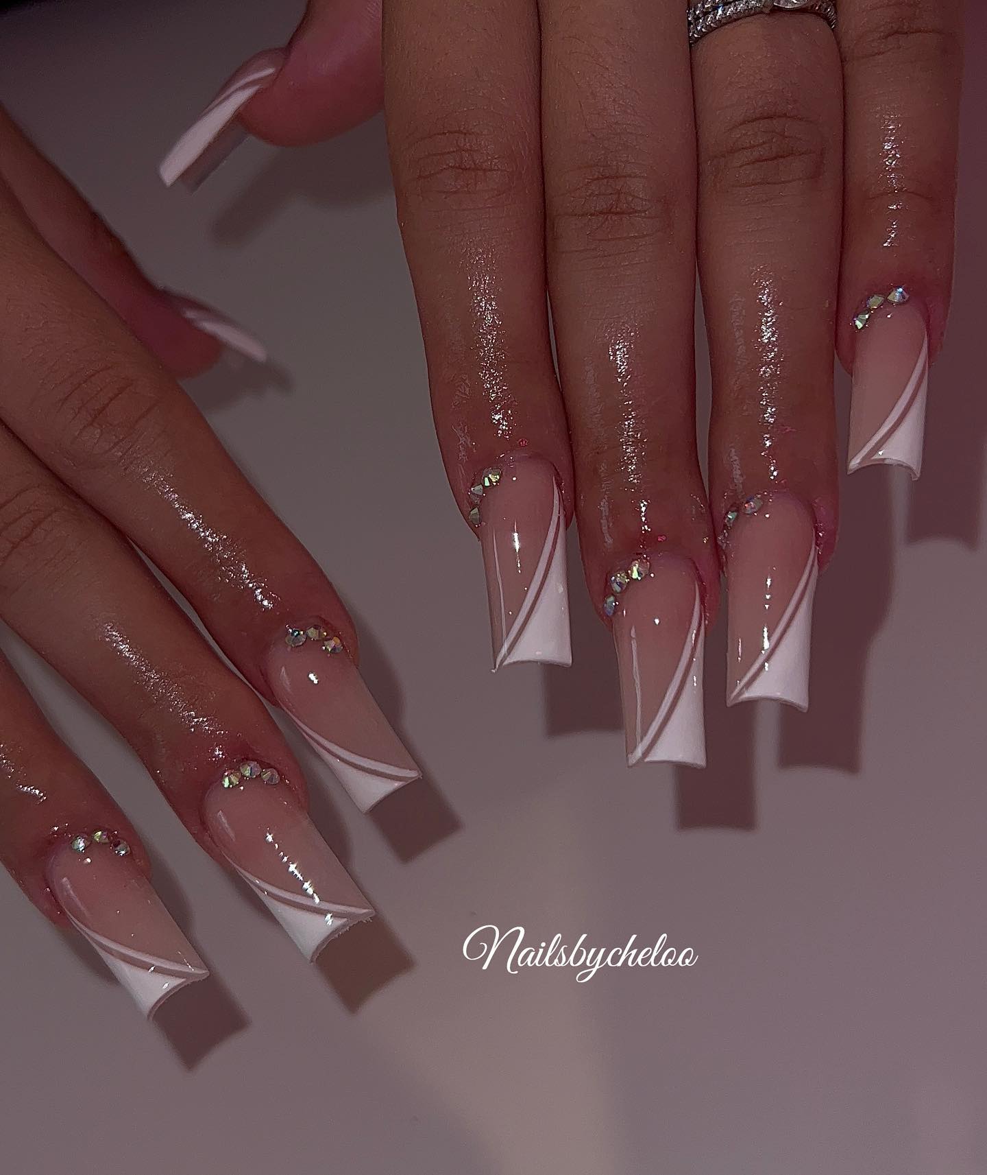 Elegant French Tip Nails with Rhinestones