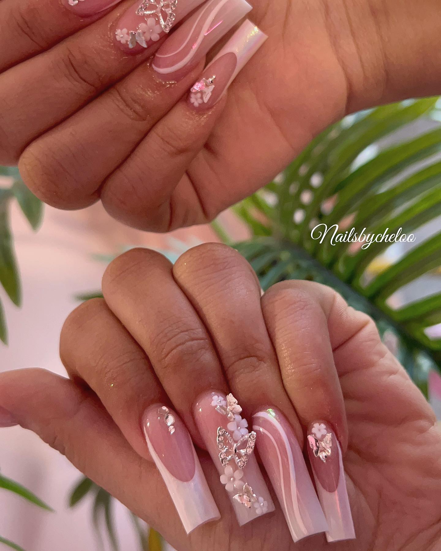 Nail Art with Floral and Rhinestone Accents