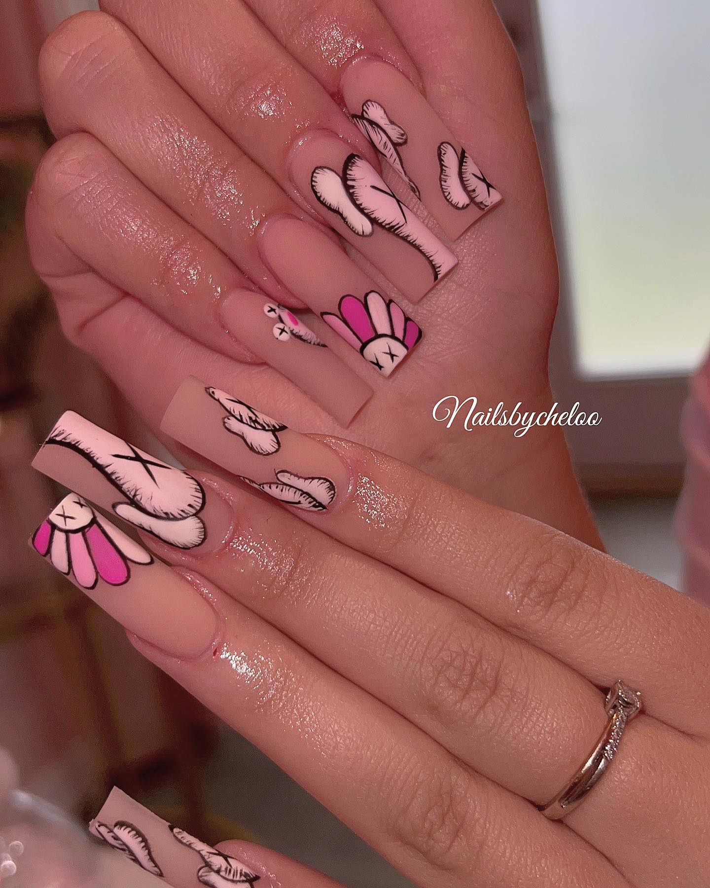 Artistic Nail Design with Floral Patterns