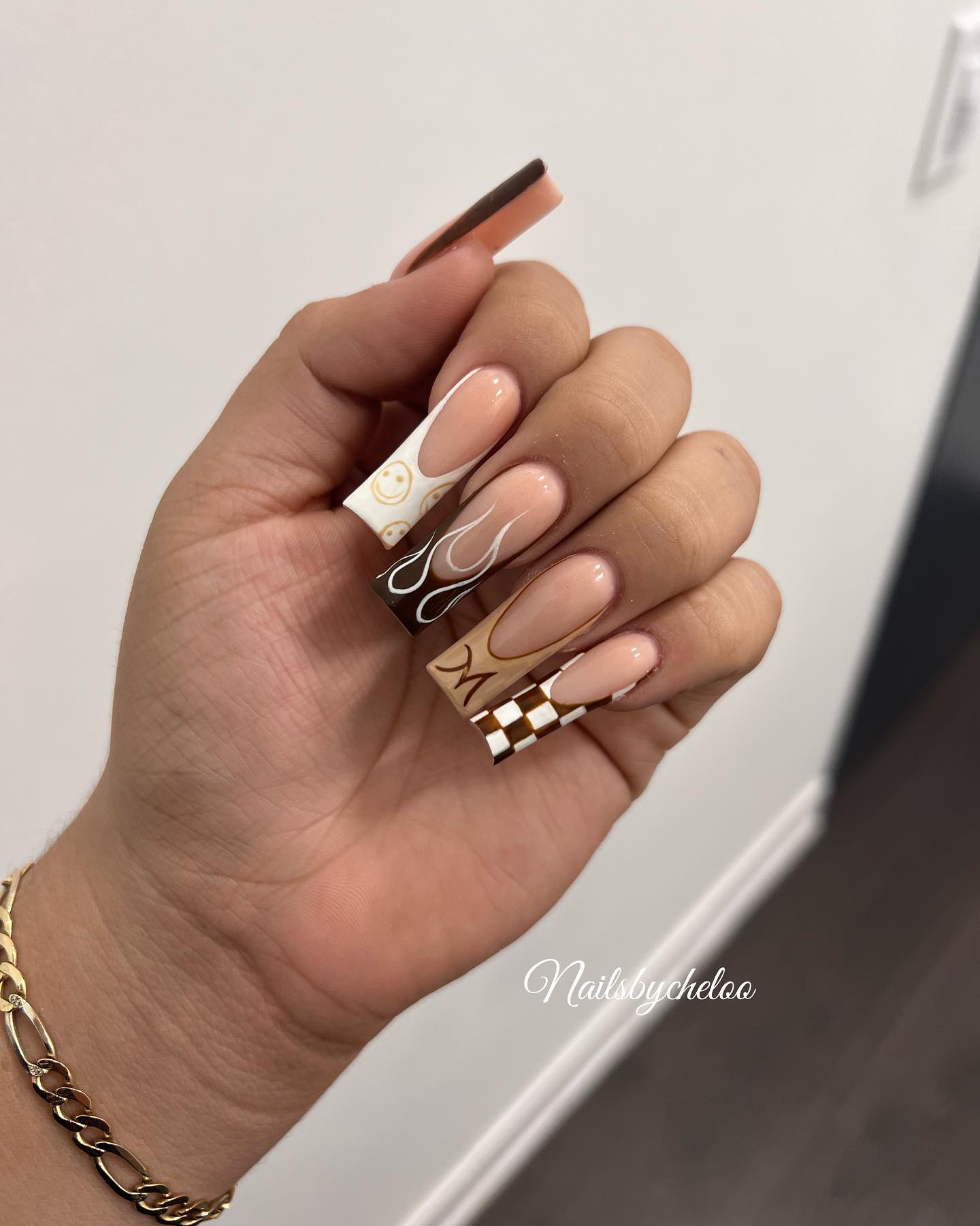 Artistic Nude and Gold Nails