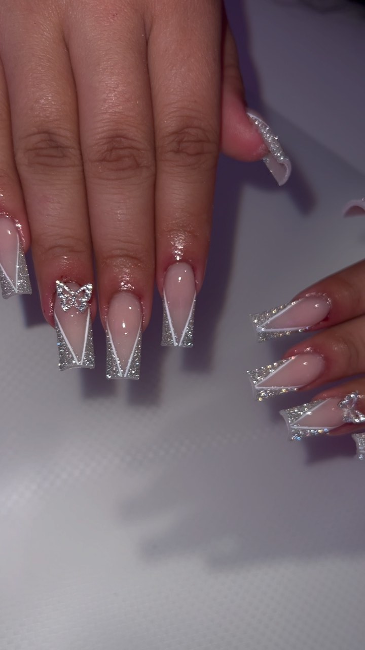 Elegant Nude and Silver Nails with Bows