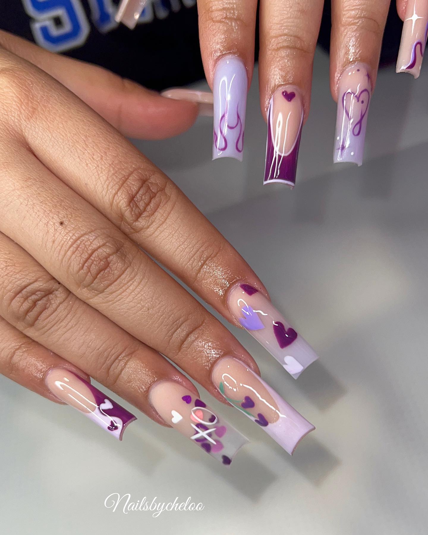 Artistic Purple and Nude Heart Nails