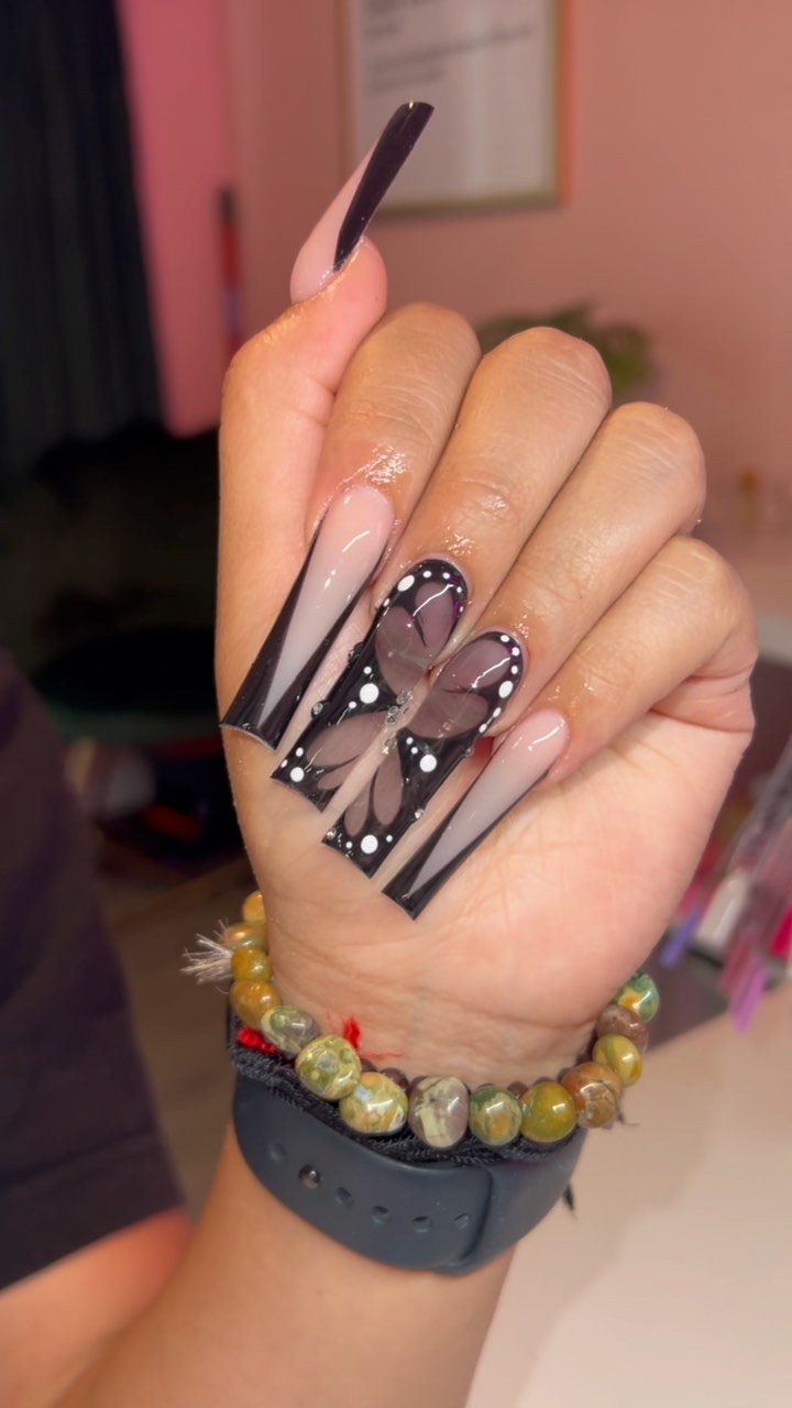 Stylish Black and Nude Butterfly Nails