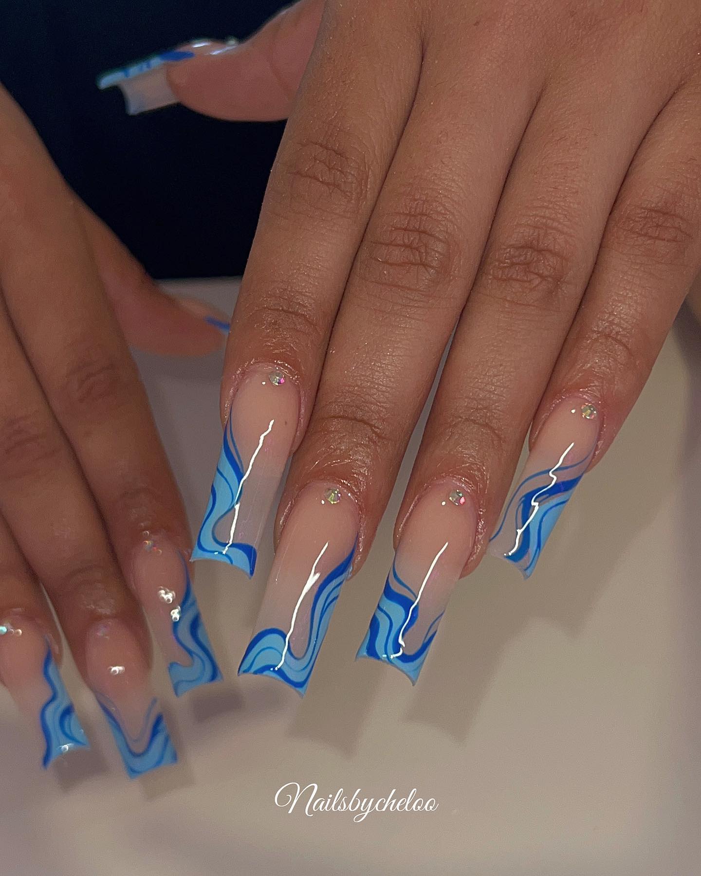 Nude and Blue Artistic Nails